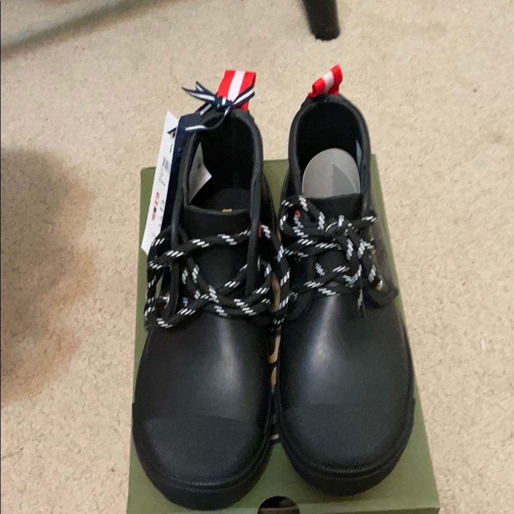 Black short kids rain boots.